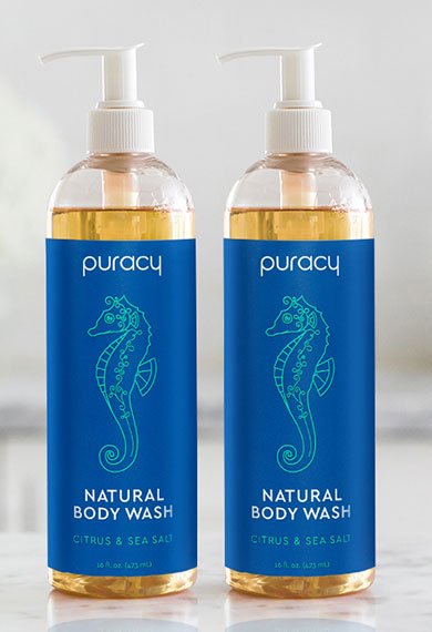 两个 Puracy 沐浴露瓶并排放置